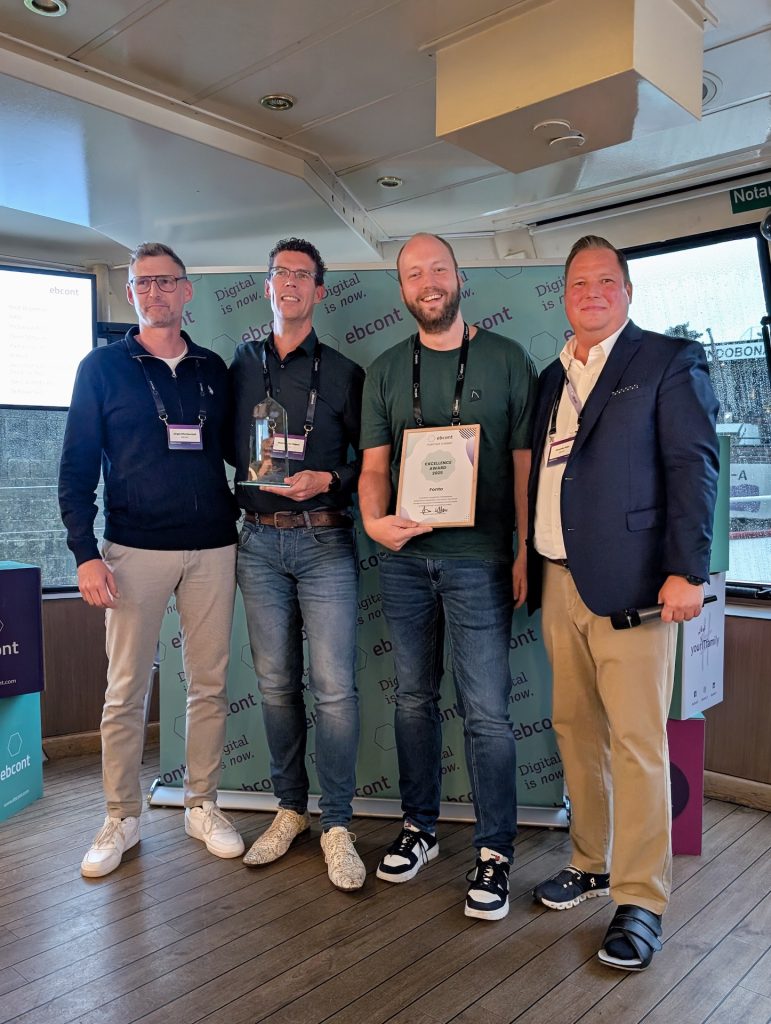 Tom and Maarten, receiving the Excellence Award from Jurgen Ritschka-Kohl and Alexander Deles